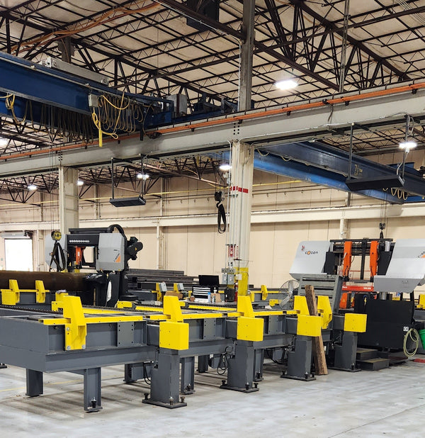 Heavy-Duty Powered Roller Conveyors  With Automated And Synchronized Material Transfer Arms