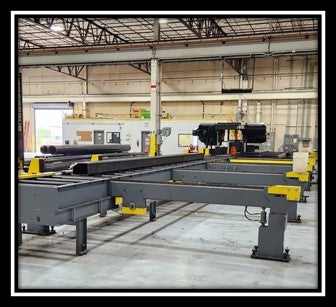 Heavy-Duty Powered Roller Conveyors  With Automated And Synchronized Material Transfer Arms